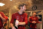 CINCINNATI - OCTOBER 10: Jayson Werth #28 of the Philadelphia Phillies shakes champagne out of his hair in the clubhouse after a sweep the Cincinnati Reds during Game 3 of the NLDS at Great American Ball Park on October 10, 2010 in Cincinnati, Ohio.The Phillies defeated the Reds 2-0. (Photo by Andy Lyons/Getty Images)