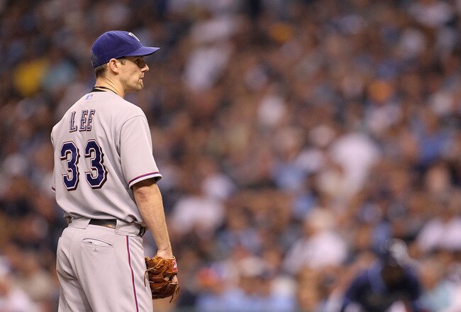 ST PETERSBURG, FL - OCTOBER 12:  Cliff Lee #33 of the Texas Rangers pitches during Game 5 of the ALDS against the Tampa Bay Rays at Tropicana Field on October 12, 2010 in St. Petersburg, Florida.  (Photo by Mike Ehrmann/Getty Images)