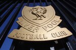LIVERPOOL, ENGLAND - OCTOBER 12:  The Liverpool Football Club emblem, the Liver Bird, adorns the  gates of Anfield on October 12, 2010 in Liverpool, England. The Royal Bank of Scotland, which holds the majority of Liverpool's debts, is seeking a high court order to prevent the American co-owners, Tom Hicks and George Gillett Jr, from removing the chairman Martin Broughton and another board member.  (Photo by Christopher Furlong/Getty Images)