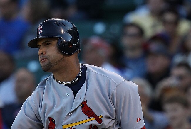 CHICAGO - SEPTEMBER 24: Albert Pujols #5 of the St. Louis Cardinals hits a single in the 9th inning against the Chicago Cubs at Wrigley Field on September 24, 2010 in Chicago, Illinois. The Cardinals defeated the Cubs 7-1. (Photo by Jonathan Daniel/Getty Images)