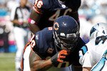 CHARLOTTE, NC - OCTOBER 10: Defensive end Julius Peppers #90 of the Chicago Bears lines up against tight end Jeff King #47 of the Carolina Panthers at Bank of America Stadium on October 10, 2010 in Charlotte, North Carolina. (Photo by Geoff Burke/Getty Images)