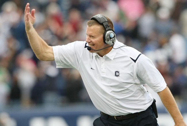 EAST HARTFORD, CT - OCTOBER 31:  Head coach Randy Edsall of the Connecticut Huskies encourages his players in the fourth quarter against the Rutgers Scarlet Knights on October 31, 2009 at Rentschler Field in East Hartford, Connecticut.  (Photo by Elsa/Getty Images)