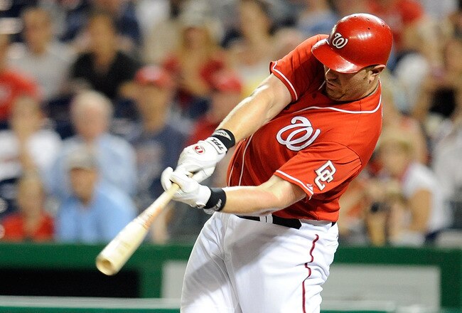 WASHINGTON - SEPTEMBER 24:  Adam Dunn #44 of the Washington Nationals hits a home run in the second inning against the Atlanta Braves at Nationals Park on September 24, 2010 in Washington, DC.  (Photo by Greg Fiume/Getty Images)