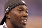 INDIANAPOLIS - SEPTEMBER 02:  Terrell Owens #81  of the Cincinnati Bengals watches from the sidelines during the NFL preseason game against the Indianapolis Colts at Lucas Oil Stadium on September 2, 2010 in Indianapolis, Indiana.  (Photo by Andy Lyons/Getty Images)