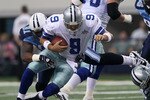 ARLINGTON, TX - OCTOBER 10:  Defensive tackle Jason Jones #91 of the Tennessee Titans sacks quarterback Tony Romo #9 of the Dallas Cowboys at Cowboys Stadium on October 10, 2010 in Arlington, Texas. (Photo by Stephen Dunn/Getty Images)