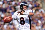 BALTIMORE, MD - OCTOBER 10: Kyle Orton #8 of the Denver Broncos passes against the Baltimore Ravens at M&T Bank Stadium on October 10, 2010 in Baltimore, Maryland. Players wore pink in recognition of Breast Cancer Awareness Month. The Ravens defeated the Broncos 31-17. (Photo by Larry French/Getty Images)