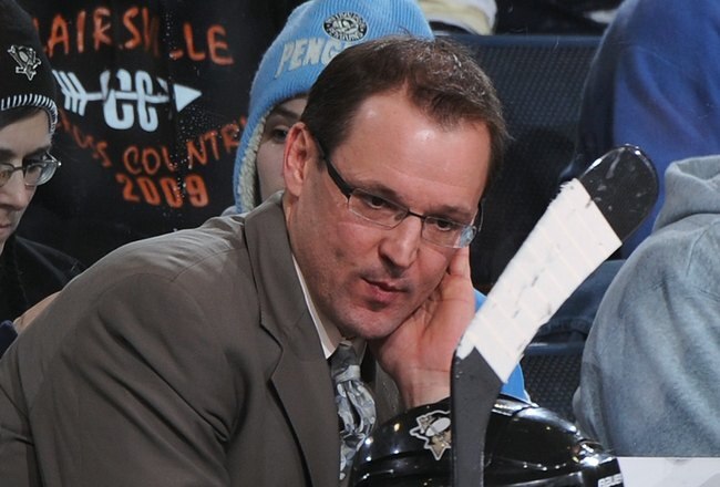 PITTSBURGH - JANUARY 21:  Head coach Dan Bylsma of the Pittsburgh Penguins watches his team play against the Washington Capitals on January 21, 2010 at Mellon Arena in Pittsburgh, Pennsylvania.  (Photo by Jamie Sabau/Getty Images)