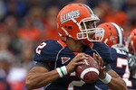 CHAMPAIGN, IL - OCTOBER 02: Nathan Scheelhaase #2 of the Illinois Fighting Illini looks for a receiver against the Ohio State Buckeyes at Memorial Stadium on October 2, 2010 in Champaign, Illinois. Ohio State defeated Illinois 24-13. (Photo by Jonathan Daniel/Getty Images)