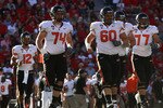 TUCSON, AZ - OCTOBER 09:  (L-R) Ryan Katz #12, Burke Ellis #74, Alex Linnenkohl #60 and Michael Philipp #77 of the Oregon State Beavers during the college football game against the Arizona Wildcats at Arizona Stadium on October 9, 2010 in Tucson, Arizona. The Beavers defeated the Wildcats 29-27.  (Photo by Christian Petersen/Getty Images)