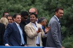 CAPE TOWN, SOUTH AFRICA - APRIL 16:  Lalit Modi (C), the Chairman of the IPL, and former captain of India Ravi Shastri (R) take part in the parade through the centre of Cape Town April 16, 2009 in Cape Town, South Africa.  (Photo by Tom Shaw/Getty Images)