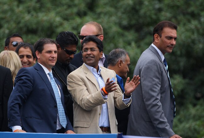 CAPE TOWN, SOUTH AFRICA - APRIL 16:  Lalit Modi (C), the Chairman of the IPL, and former captain of India Ravi Shastri (R) take part in the parade through the centre of Cape Town April 16, 2009 in Cape Town, South Africa.  (Photo by Tom Shaw/Getty Images)