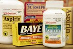 CHICAGO - MAY 26:  Aspirin products sit on the shelf at a Walgreens drug store May 26, 2004 in Chicago, Illinois. A recent study has linked frequent use of aspirin with a reduced risk of breast cancer in women. (Photo by Scott Olson/Getty Images)