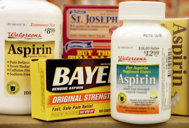 CHICAGO - MAY 26:  Aspirin products sit on the shelf at a Walgreens drug store May 26, 2004 in Chicago, Illinois. A recent study has linked frequent use of aspirin with a reduced risk of breast cancer in women. (Photo by Scott Olson/Getty Images)