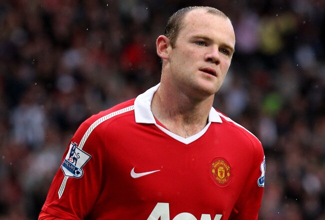 MANCHESTER, ENGLAND - AUGUST 28:  Wayne Rooney of Manchester United celebrates scoring the opening goal during the Barclays Premier League match between Manchester United and West Ham United at Old Trafford on August 28, 2010 in Manchester, England. (Photo by Alex Livesey/Getty Images)