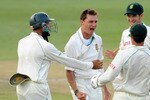 JOHANNESBURG, SOUTH AFRICA - JANUARY 16:  Dale Steyn of South Africa celebrates with team mates the wicket of Jonathan Trott of England during day 3 of the 4th Test match between South Africa and England at the Wanderers cricket ground on January 16, 2010 in Johannesburg, South Africa.  (Photo by Lee Warren/Gallo Images/Getty Images)
