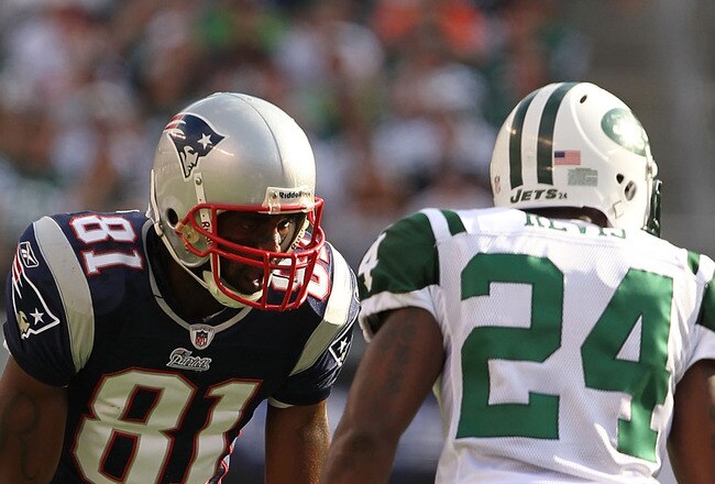 EAST RUTHERFORD, NJ - SEPTEMBER 19:  Darrelle Revis #24 of the New York Jets defends against Randy Moss #81 of the New England Patriots during their  game on September 19, 2010 at the New Meadowlands Stadium  in East Rutherford, New Jersey.  (Photo by Al Bello/Getty Images)