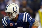 INDIANAPOLIS, IN - OCTOBER 10: Peyton Manning #18 of the Indianapolis Colts runs with the football against the Kansas City Chiefs at Lucas Oil Stadium on October 10, 2010 in Indianapolis, Indiana. The Colts defeated the Chiefs 19-9. (Photo by Scott Boehm/Getty Images)