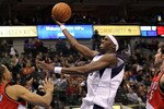 DALLAS - JANUARY 30:  Forward Josh Howard #5 of the Dallas Mavericks takes a shot against Juwan Howard #6 of the Portland Trail Blazers on January 30, 2010 at American Airlines Center in Dallas, Texas.  NOTE TO USER: User expressly acknowledges and agrees that, by downloading and/or using this Photograph, user is consenting to the terms and conditions of the Getty Images License Agreement.  (Photo by Ronald Martinez/Getty Images)