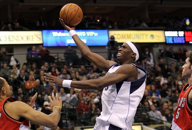 DALLAS - JANUARY 30:  Forward Josh Howard #5 of the Dallas Mavericks takes a shot against Juwan Howard #6 of the Portland Trail Blazers on January 30, 2010 at American Airlines Center in Dallas, Texas.  NOTE TO USER: User expressly acknowledges and agrees that, by downloading and/or using this Photograph, user is consenting to the terms and conditions of the Getty Images License Agreement.  (Photo by Ronald Martinez/Getty Images)