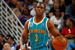 NEW ORLEANS - OCTOBER 13:  Chris Paul #3 of the New Orleans Hornets drives the ball up the court during the game against the Miami Heat at the New Orleans Arena on October 13, 2010 in New Orleans, Louisiana. NOTE TO USER: User expressly acknowledges and agrees that, by downloading and/or using this Photograph, User is consenting to the terms and conditions of the Getty Images License Agreement.  (Photo by Chris Graythen/Getty Images)