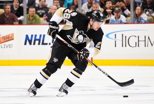 PITTSBURGH - OCTOBER 13:  Eric Tangradi #26 of the Pittsburgh Penguins skates with the puck against the Toronto Maple Leafs on October 13, 2010 at Consol Energy Center in Pittsburgh, Pennsylvania.  (Photo by Jamie Sabau/Getty Images)