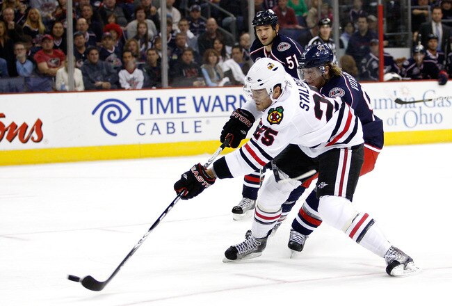 COLUMBUS,OH - October 15:  Viktor Stalberg #25 of the Chicago Blackhawks gets a shot off and beats goaltender Steve Mason #1 of the Columbus Blue Jackets for the first goal of the game during the first period on October 15, 2010 at Nationwide Arena in Columbus, Ohio.  (Photo by John Grieshop/Getty Images)