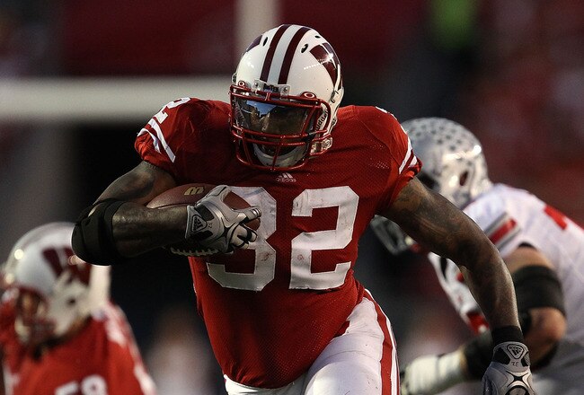 MADISON, WI - OCTOBER 16: John Clay #32 of the Wisconsin Badgers runs for a first down against the Ohio State Buckeyes at Camp Randall Stadium on October 16, 2010 in Madison, Wisconsin. (Photo by Jonathan Daniel/Getty Images)