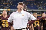 MINNEAPOLIS - NOVEMBER 01:  Head Coach Tim Brewster of the Minnesota Golden Gophers and his players react to a 24-17 loss to the Northwestern Wildcats during the fourth quarter at the Hubert H.Humphrey Metrodome on November 1, 2008 in Minneapolis, Minnesota. (Photo by Harry How/Getty Images)