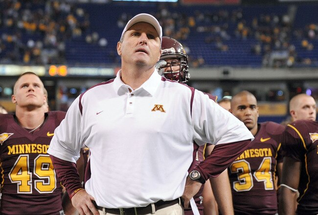 MINNEAPOLIS - NOVEMBER 01:  Head Coach Tim Brewster of the Minnesota Golden Gophers and his players react to a 24-17 loss to the Northwestern Wildcats during the fourth quarter at the Hubert H.Humphrey Metrodome on November 1, 2008 in Minneapolis, Minnesota. (Photo by Harry How/Getty Images)