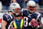 FOXBORO, MA - OCTOBER 17:  Wes Welker #83 celebrate with teammate Deion Branch #84, both of the New England Patriots, after Branch caught a touchdown pass in the second half against the Baltimore Ravens at Gillette Stadium on October 17, 2010 in Foxboro, Massachusetts. The Patriot won 23-20 in overtime.  (Photo by Jim Rogash/Getty Images)