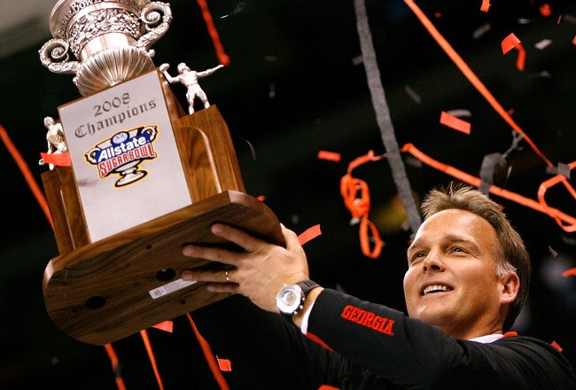 NEW ORLEANS - JANUARY 01:  Head coach Mark Richt of the Georgia Bulldogs celebrates with the trophy after their 41-10 win against the Hawai'i Warriors during the Allstate Sugar Bowl at the Louisiana Superdome on January 1, 2008 in New Orleans, Louisiana.  (Photo by Kevin C. Cox/Getty Images)