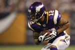 MINNEAPOLIS - NOVEMBER 22:  Percy Harvin #12 of the Minnesota Vikings runs the ball against the Seattle Seahawks at Hubert H. Humphrey Metrodome on November 22, 2009 in Minneapolis, Minnesota.  (Photo by Nick Laham/Getty Images)