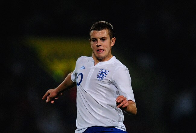 NORWICH, ENGLAND - OCTOBER 08:  Jack Wilshere of England in action during the UEFA U21 Championship Play-Off, First Leg match between England and Romania at Carrow Road on October 8, 2010 in Norwich, England.  (Photo by Jamie McDonald/Getty Images)