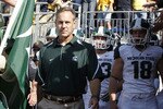 ANN ARBOR, MI - OCTOBER 09:  Michigan State head coach Mark Dantonio gets ready to enter the field prior to the start of the game against the Michigan Wolverines October 9, 2010 at Michigan Stadium in Ann Arbor, Michigan. The Spartans defeated the Wolverines 34-17.  (Photo by Leon Halip/Getty Images)