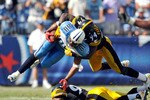 NASHVILLE, TN - SEPTEMBER 19:  Lawrence Timmons #94 of the Pittsburgh Steelers tackles Bo Scaife #80 of the Tennessee Titans at LP Field on September 19, 2010 in Nashville, Tennessee. The Steelers won 19-11.  (Photo by Grant Halverson/Getty Images)