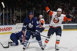 UNIONDALE, NY - DECEMBER 23: John Tavares #91 of the New York Islanders celebrates scoring at 12:17 of the second period against the Toronto Maple Leafs at Nassau Coliseum on December 23, 2009 in Uniondale, New York.  (Photo by Bruce Bennett/Getty Images)