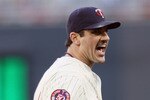 MINNEAPOLIS - OCTOBER 07:  Carl Pavano #48 of the Minnesota Twins celebrates after the third out in the first inning against the New York Yankees during game two of the ALDS on October 7, 2010 at Target Field in Minneapolis, Minnesota.  (Photo by Elsa/Getty Images)