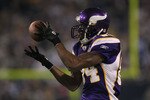 MINNEAPOLIS - OCTOBER 17:  Wide receiver Randy Moss #84 of the Minnesota Vikings catches a pass during the third quarter at Mall of America Field on October 17, 2010 in Minneapolis, Minnesota. The Vikings defeated the Cowboys 24-21.  (Photo by Jeff Gross/Getty Images)