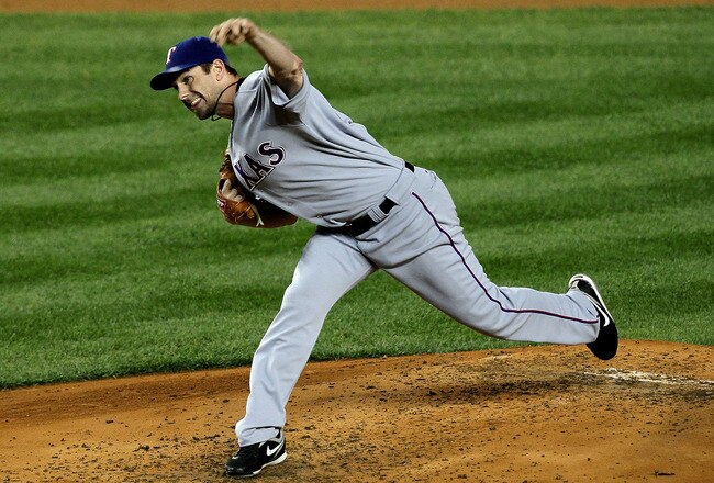 NEW YORK - OCTOBER 18:  Cliff Lee #33 of the Texas Rangers throws a pitch against the New York Yankees in Game Three of the ALCS during the 2010 MLB Playoffs at Yankee Stadium on October 18, 2010 in New York, New York.  (Photo by Jim McIsaac/Getty Images)