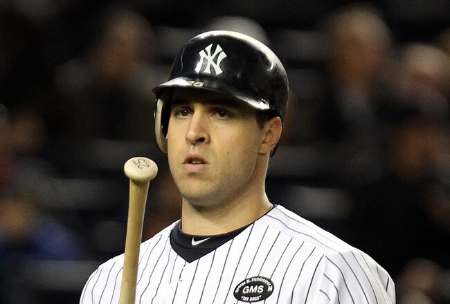 NEW YORK - OCTOBER 18:  Mark Teixeira #25 of the New York Yankees reacts after he struck out for the final out of the game against the Texas Rangers in Game Three of the ALCS during the 2010 MLB Playoffs at Yankee Stadium on October 18, 2010 in New York, New York. THe Rangers won 8-0.  (Photo by Al Bello/Getty Images)