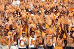 KNOXVILLE, TN - SEPTEMBER 18:  Orange-clad Tennessee Volunteers fans sing along with 'Rocky Top' during a game against the Florida Gators at Neyland Stadium on September 18, 2010 in Knoxville, Tennessee. Florida won 31-17.  (Photo by Grant Halverson/Getty Images)