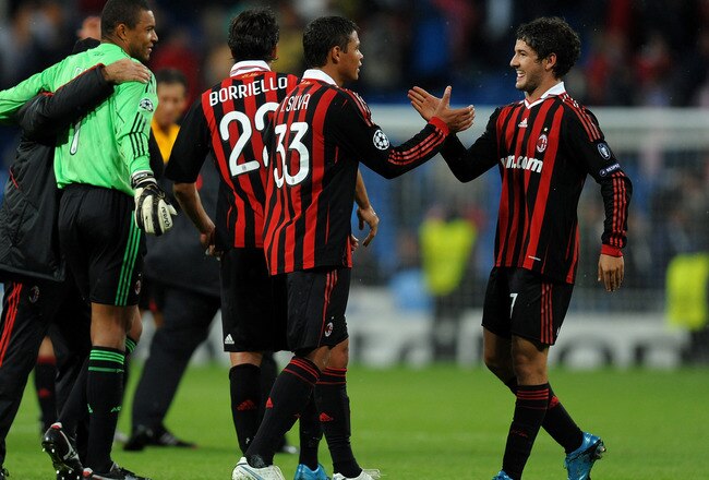 MADRID, SPAIN - OCTOBER 21:  Pato (R) of AC Milan celebrates with his teammate Thiago Silva (2nd R) at the end of the Champions League group C match between Real Madrid and AC Milan at the Estadio Santiago Bernabeu on October 21, 2009 in Madrid, Spain. AC Milan won the match 3-2.  (Photo by Jasper Juinen/Getty Images)