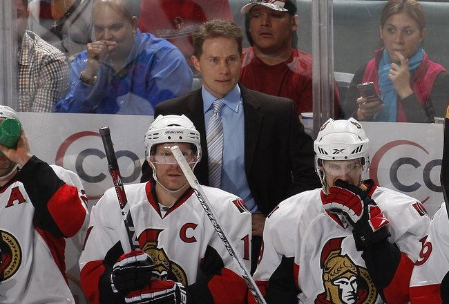 SUNRISE, FL - OCTOBER 28: Head coach Cory Clouston of the Ottawa Senators watches play during the third period of the game against the Florida Panthers on October 28, 2009 at the BankAtlantic Center in Sunrise, Florida. The Senators defeated the Panthers 4-3. (Photo by Joel Auerbach/Getty Images)
