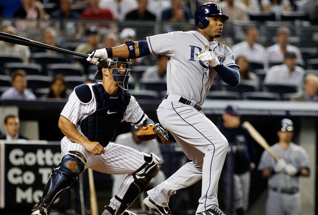 NEW YORK - SEPTEMBER 23: Carl Crawford ##13 of the Tampa Bay Rays grounds out in the first-inning against the New York Yankees on September 23, 2010 at Yankee Stadium in the Bronx borough of New York City.  (Photo by Mike Stobe/Getty Images)