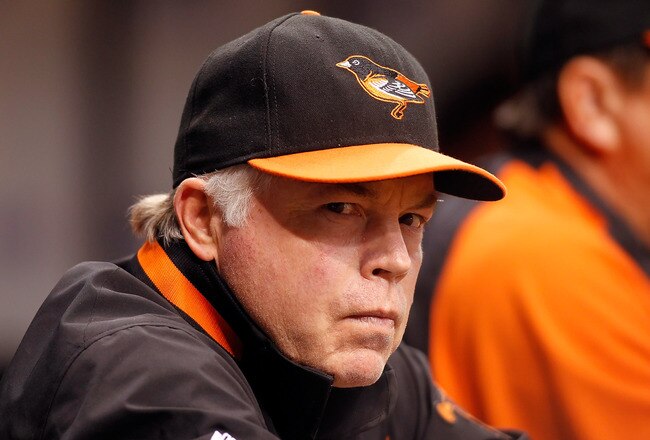 ST. PETERSBURG, FL - SEPTEMBER 29:  Manager Buck Showalter of the Baltimore Orioles watches his team against the Tampa Bay Rays during the game at Tropicana Field on September 29, 2010 in St. Petersburg, Florida.  (Photo by J. Meric/Getty Images)