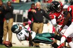 PHILADELPHIA - OCTOBER 17:  DeSean Jackson #10 of the Philadelphia Eagles is laid out by Dunta Robinson #23 of the Atlanta Falcons during their game at Lincoln Financial Field on October 17, 2010 in Philadelphia, Pennsylvania.  Both players were injured on the play and had to be helped off the field.  (Photo by Al Bello/Getty Images)