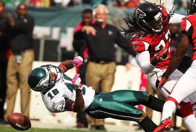PHILADELPHIA - OCTOBER 17:  DeSean Jackson #10 of the Philadelphia Eagles is laid out by Dunta Robinson #23 of the Atlanta Falcons during their game at Lincoln Financial Field on October 17, 2010 in Philadelphia, Pennsylvania.  Both players were injured on the play and had to be helped off the field.  (Photo by Al Bello/Getty Images)