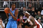 KANSAS CITY, MO - OCTOBER 8: Kevin Durant #35 of the Oklahoma City Thunder looks to drive past LeBron James #6 of the Miami Heat before the game on October 8, 2010 at the Sprint Center in Kansas City, Missouri.  NOTE TO USER: User expressly acknowledges and agrees that, by downloading and or using this photograph, User is consenting to the terms and conditions of the Getty Images License Agreement. Mandatory Copyright Notice: Copyright 2010 NBAE  (Photo by Joe Murphy/NBAE via Getty Images)