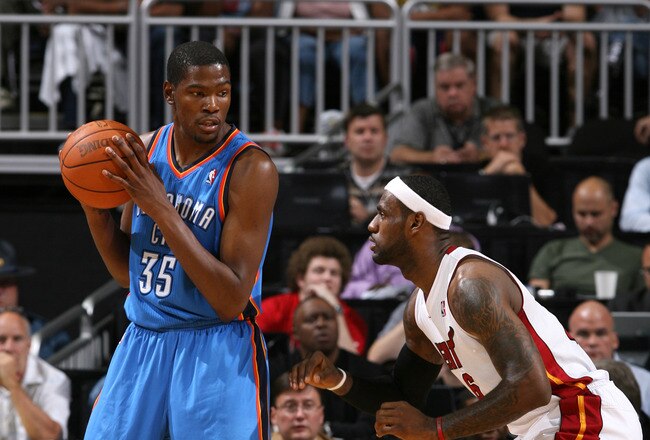KANSAS CITY, MO - OCTOBER 8: Kevin Durant #35 of the Oklahoma City Thunder looks to drive past LeBron James #6 of the Miami Heat before the game on October 8, 2010 at the Sprint Center in Kansas City, Missouri.  NOTE TO USER: User expressly acknowledges and agrees that, by downloading and or using this photograph, User is consenting to the terms and conditions of the Getty Images License Agreement. Mandatory Copyright Notice: Copyright 2010 NBAE  (Photo by Joe Murphy/NBAE via Getty Images)
