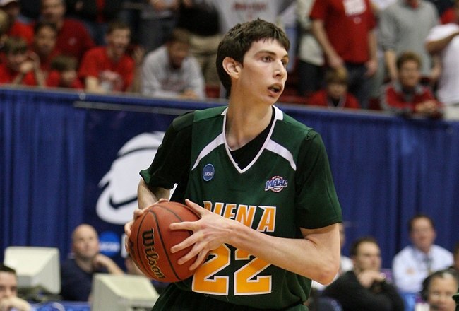 DAYTON, OH - MARCH 20: Ryan Rossiter #22 of the Siena Saints handles the ball against the Ohio State Buckeyes during the first round of the NCAA Division I Men's Basketball Tournament at the University of Dayton Arena on March 20, 2009 in Dayton, Ohio.  (Photo by Andy Lyons/Getty Images)